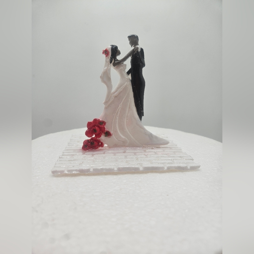 Elegant Wedding Cake Topper with Red Accents
